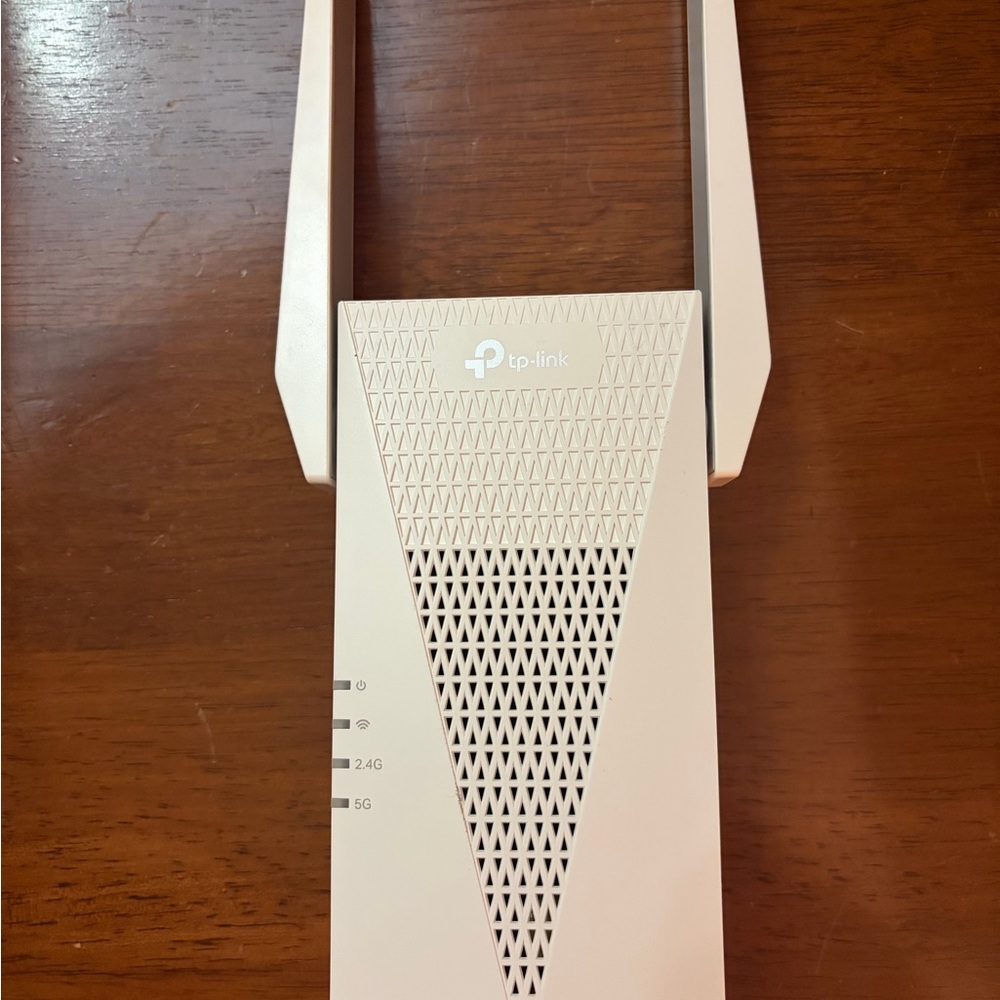TP-Link Wi-Fi Range Extender in Cream